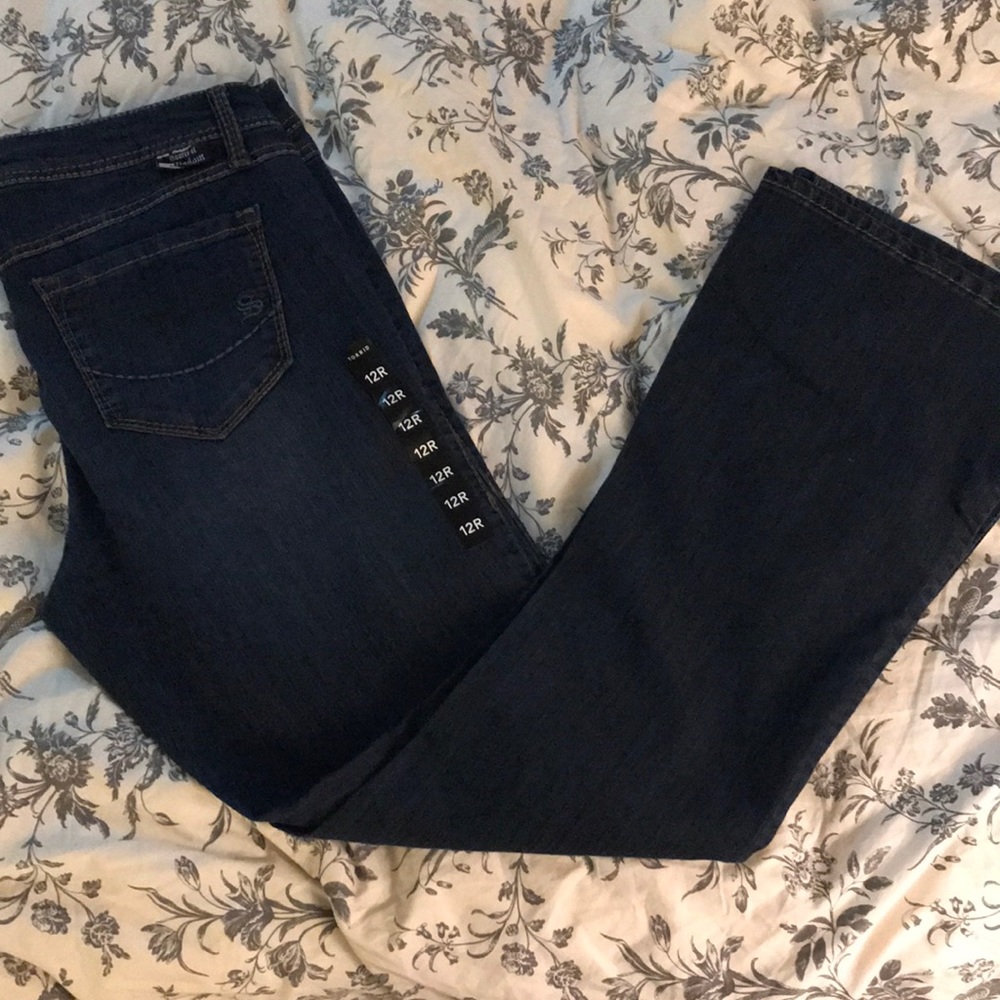 Torrid Source of wisdom dark wash flare jeans